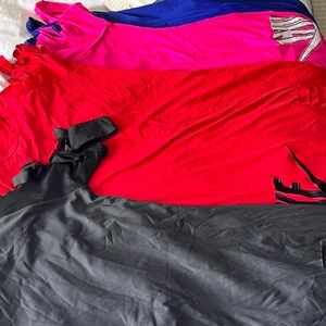 Nike, dress thigh length, with rips in sleeves and one thigh